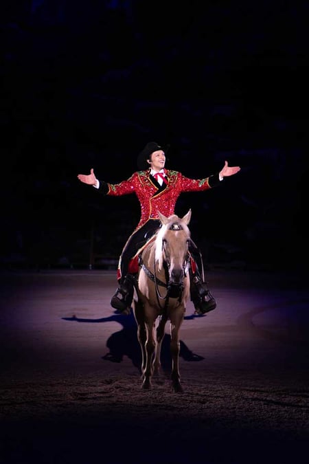 Christmas emcee on a horse