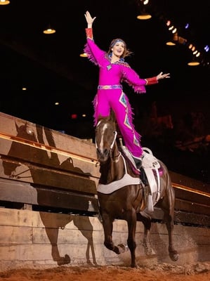 Stampede performer riding a horse