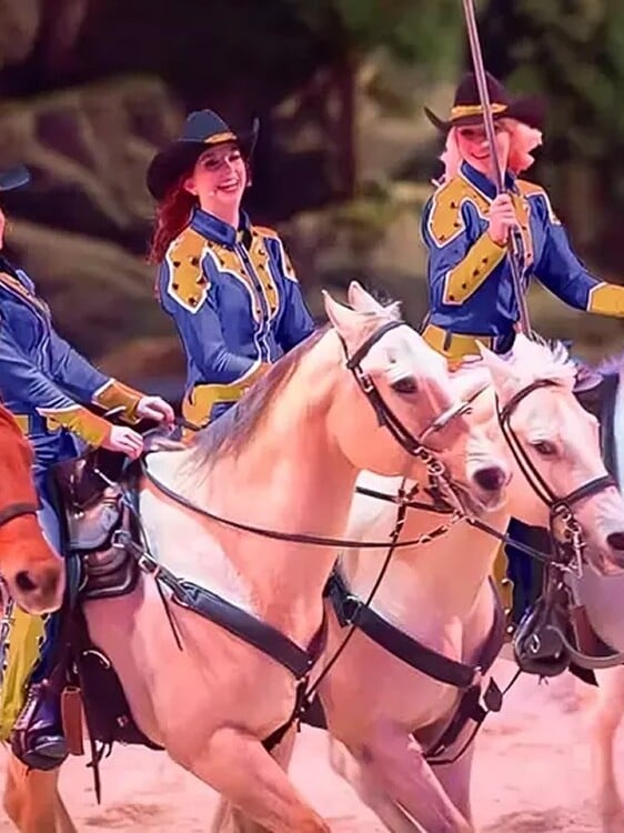 Stampede performers riding horses