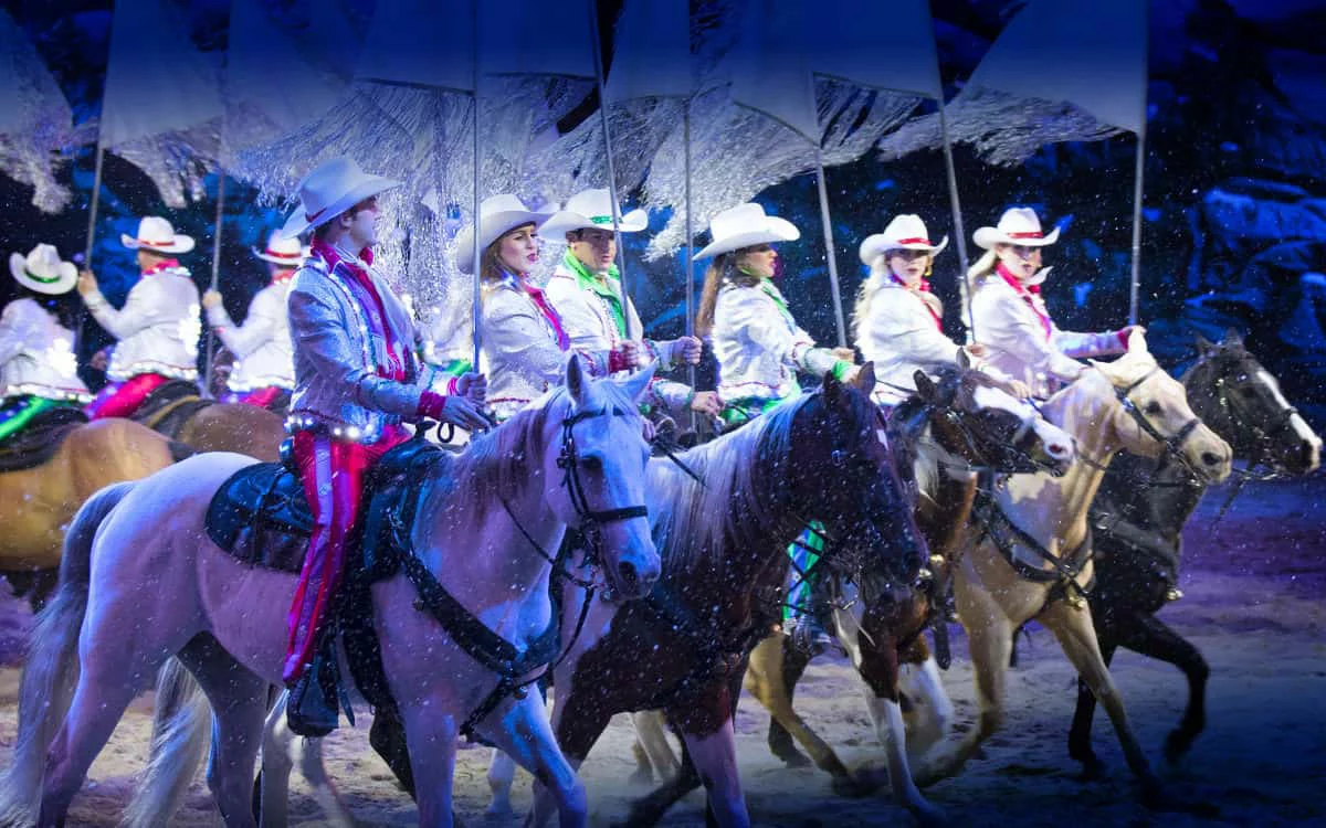 performers on horses during Christmas show at Dolly Parton’s Stampede
