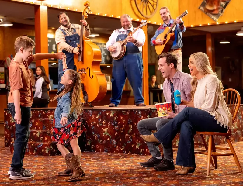 family enjoying pre-show entertainment