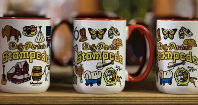 Dolly Parton's Stampede coffee mugs in gift shop