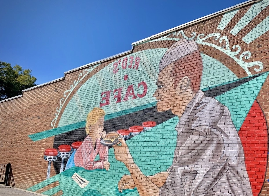 red's cafe dolly parton mural